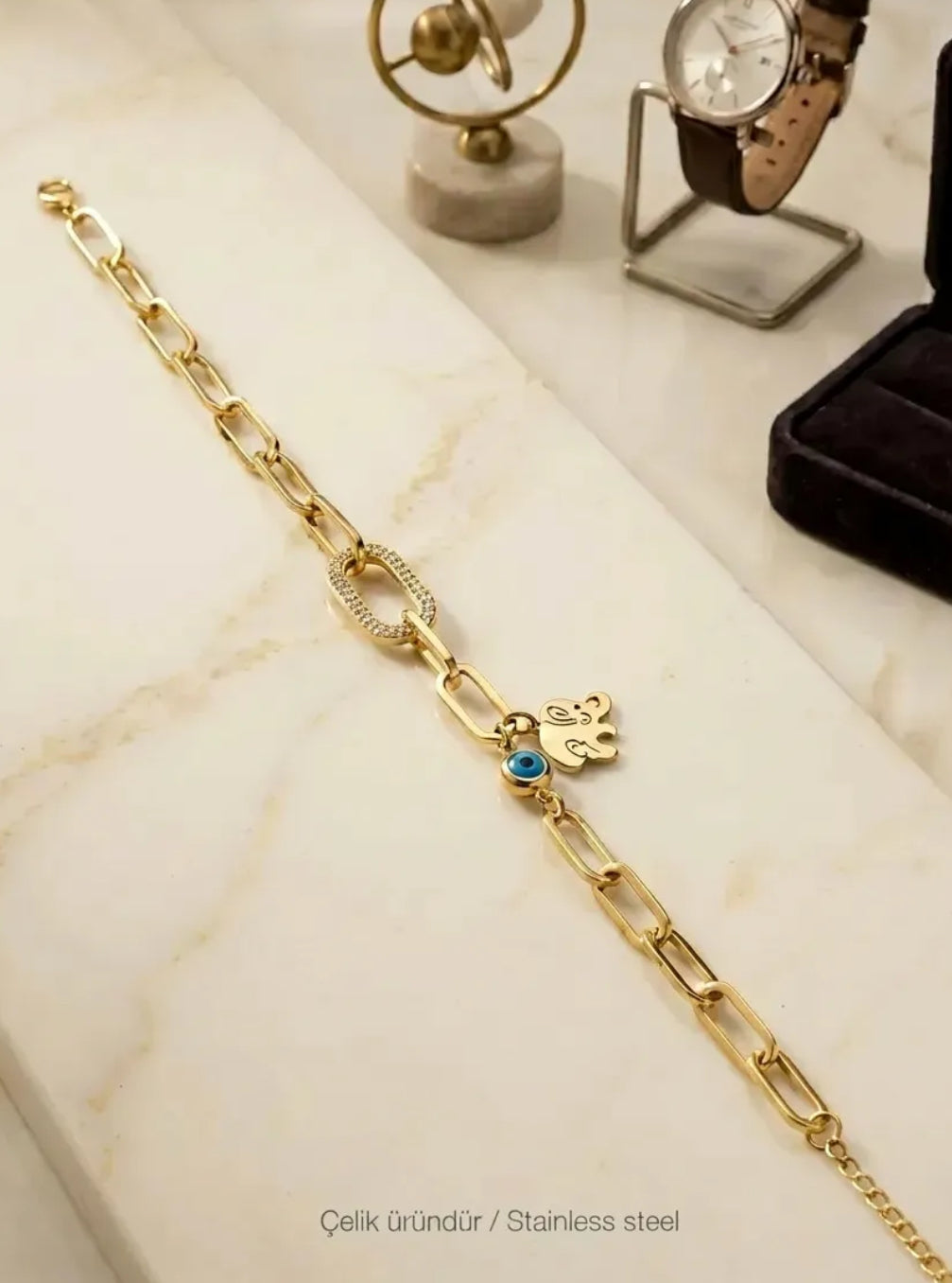 VİP SERİ FİL VE NAZAR DETAYLI GOLD ÇELİK BİLEKLİK